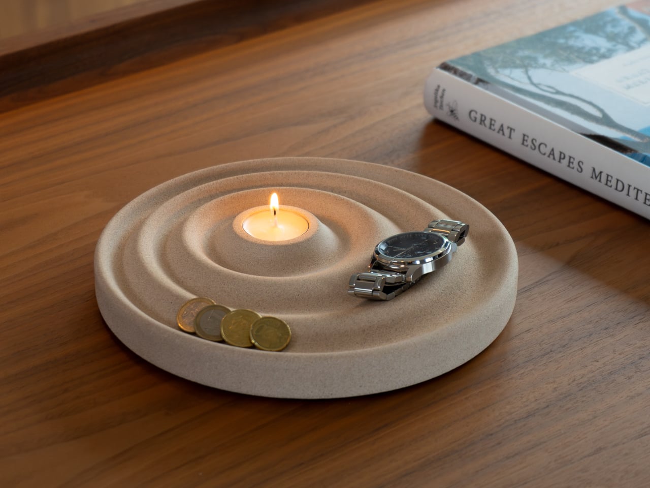 This €235 Rippling Stone Valet Tray Has a Candle Holder Built InMost entryway surfaces tell a familiar story, and it’s rarely a flattering one. Keys get tossed wherever there’s space, coins scatter to the edges, and...