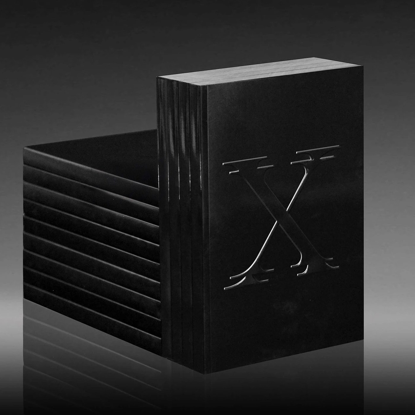 Forth+Back Studio releases Drool, a display serif typeface design inspired by H.R. Giger's Xenomorph, showcased in a striking 200-page type specimen book.
The visual system operates with a biomechanic...