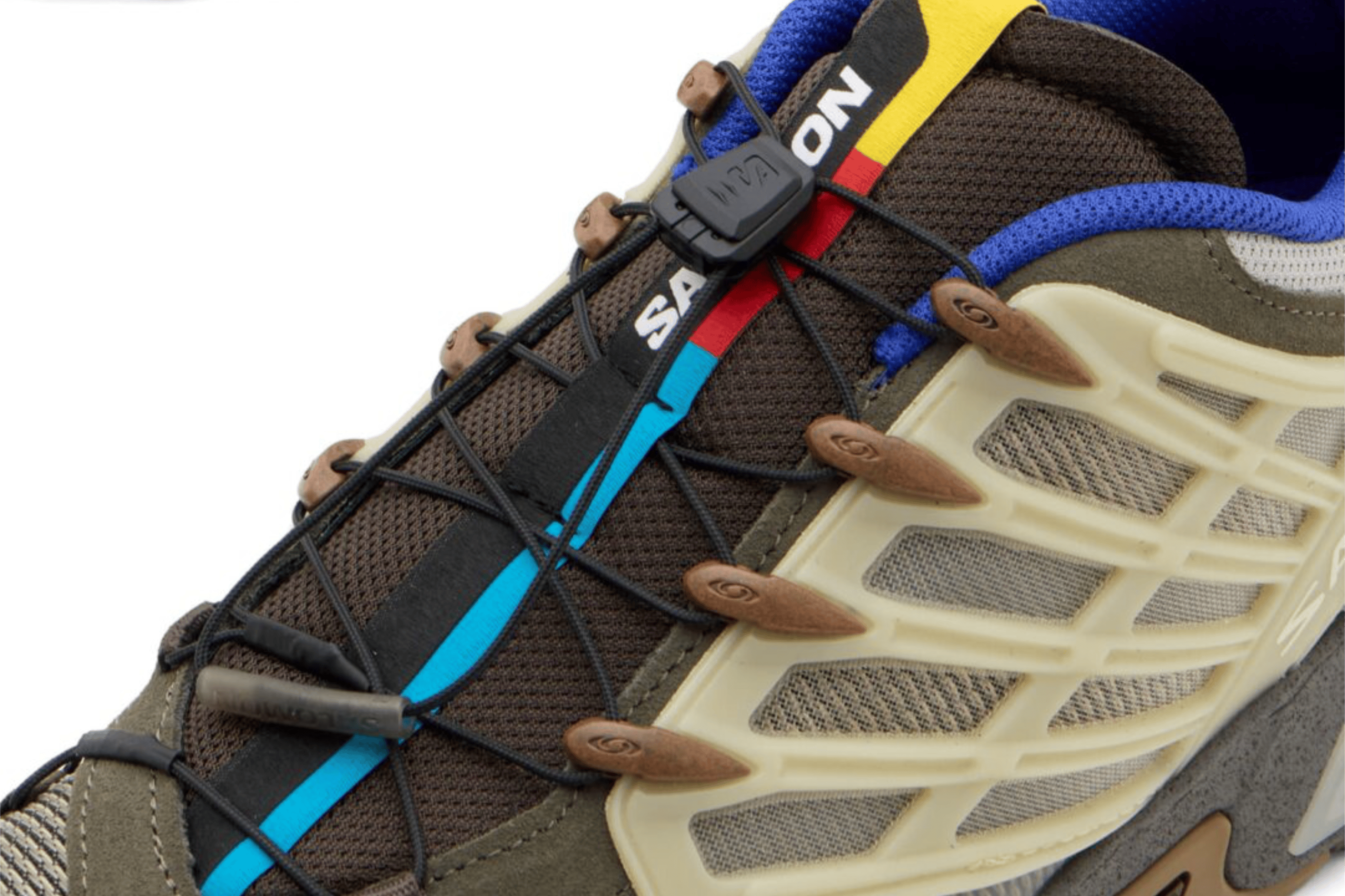 Salomon teams up with British label A-COLD-WALL* for the ACS Pro, blending tonal earth tones, premium suede and mesh detail.